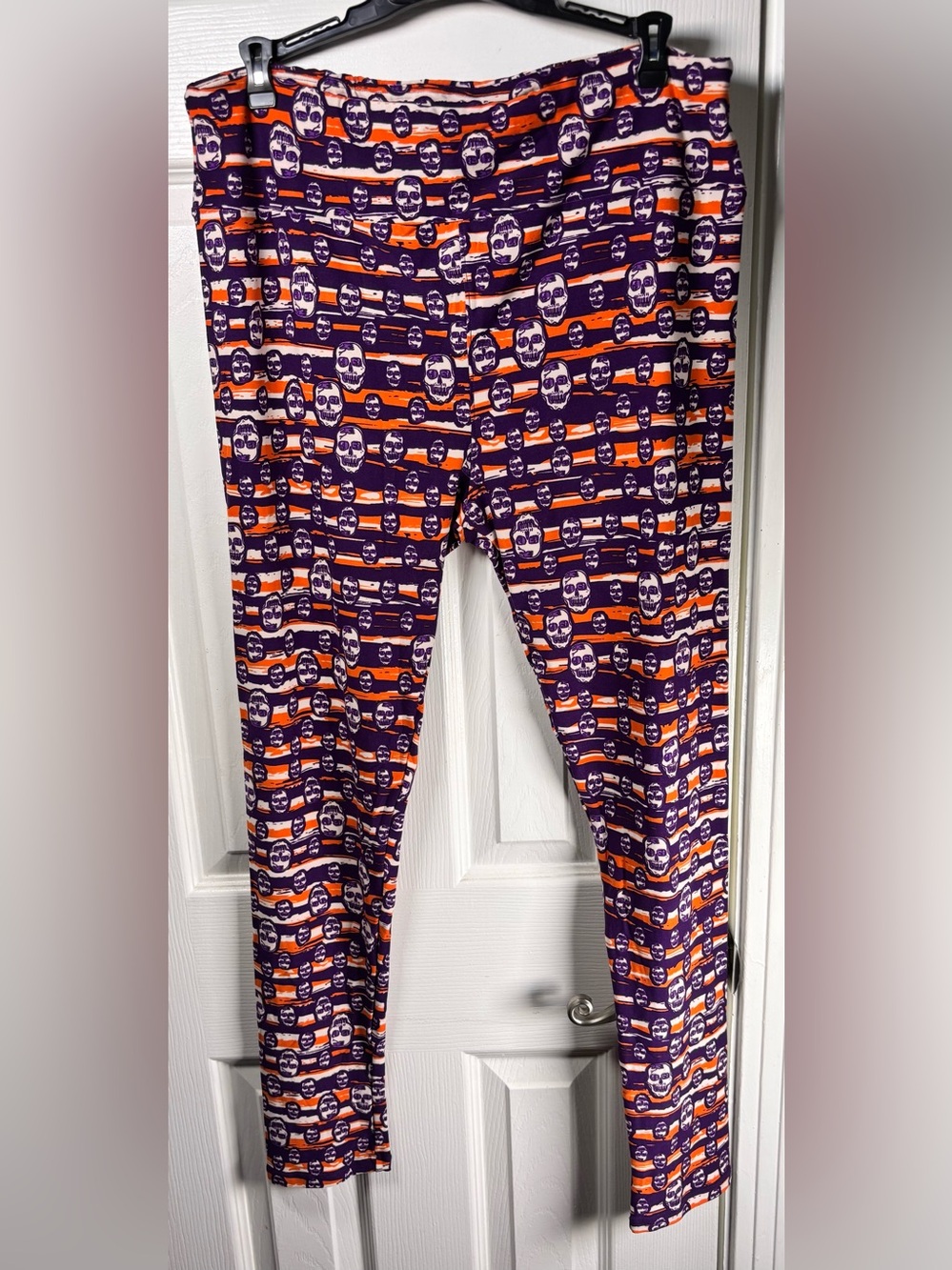 LuLaRoe Purple and Orange Skull Stripe Leggings